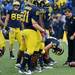 Michigan head coach Brady Hoke shouts at his players during a warm up drill before the start of Homecoming at Michigan Stadium on Saturday.  Melanie Maxwell I AnnArbor.com